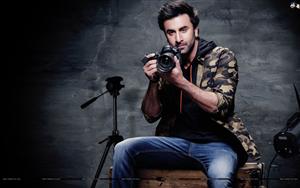 Ranbir Kapoor looks classy while posing with a camera